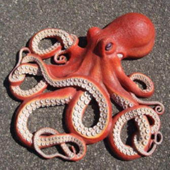 A red octopus on the ground Description automatically generated