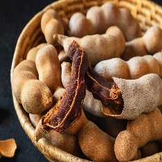 A basket of tamarind Description automatically generated